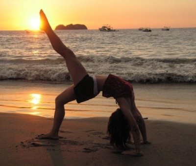 islena-sunset-beach-wheel-yoga